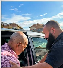 Our driver helping a passenger into the vehicle